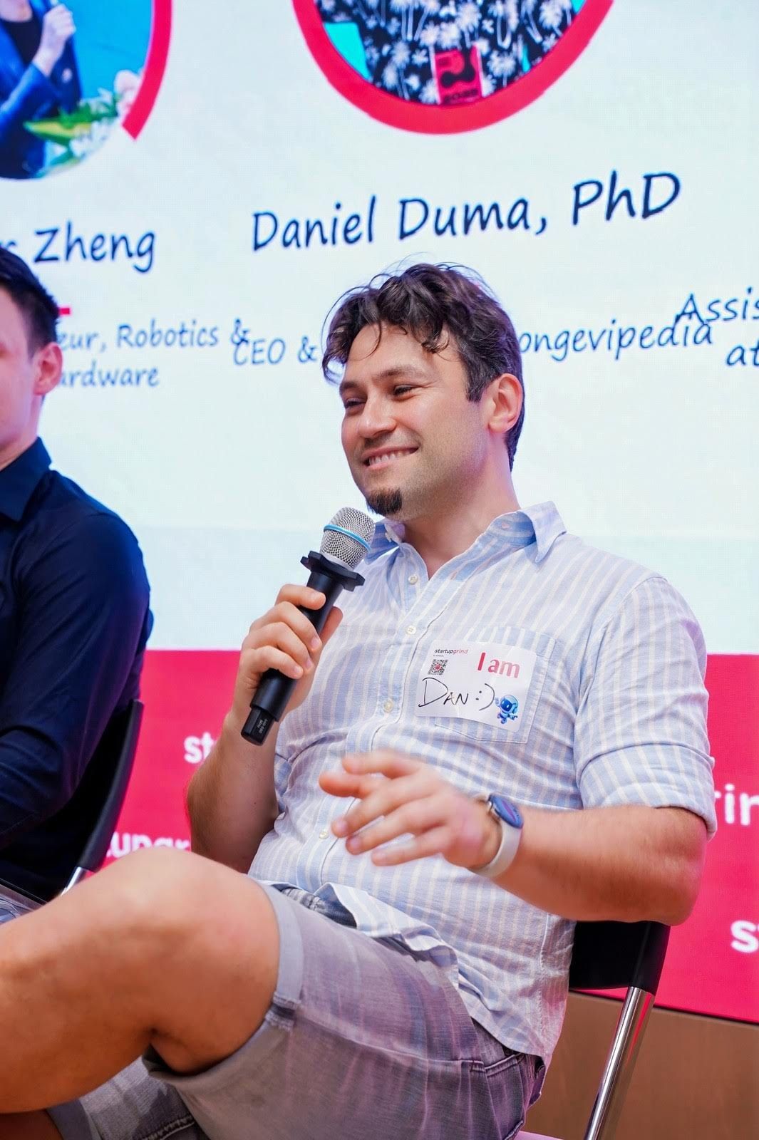 Daniel Duma speaking on a panel at Startup Grind Shenzhen